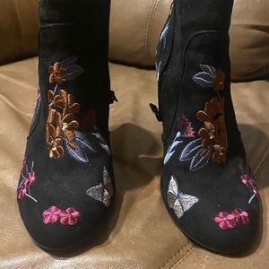 Gently worn Bamboo brand black heeled boots with colored embroidery.